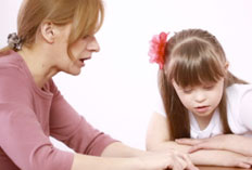 Volunteer working with children